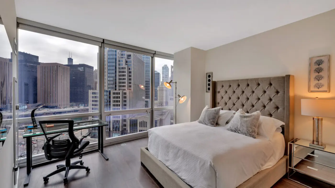 Group of professionals enjoying a luxury furnished corporate apartment in Downtown Chicago.