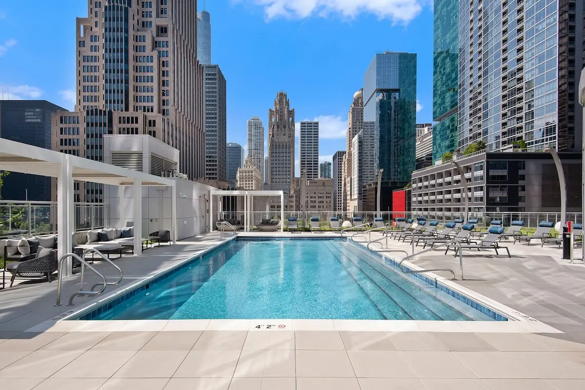 Group of professionals enjoying a luxury furnished corporate apartment in Downtown Chicago.