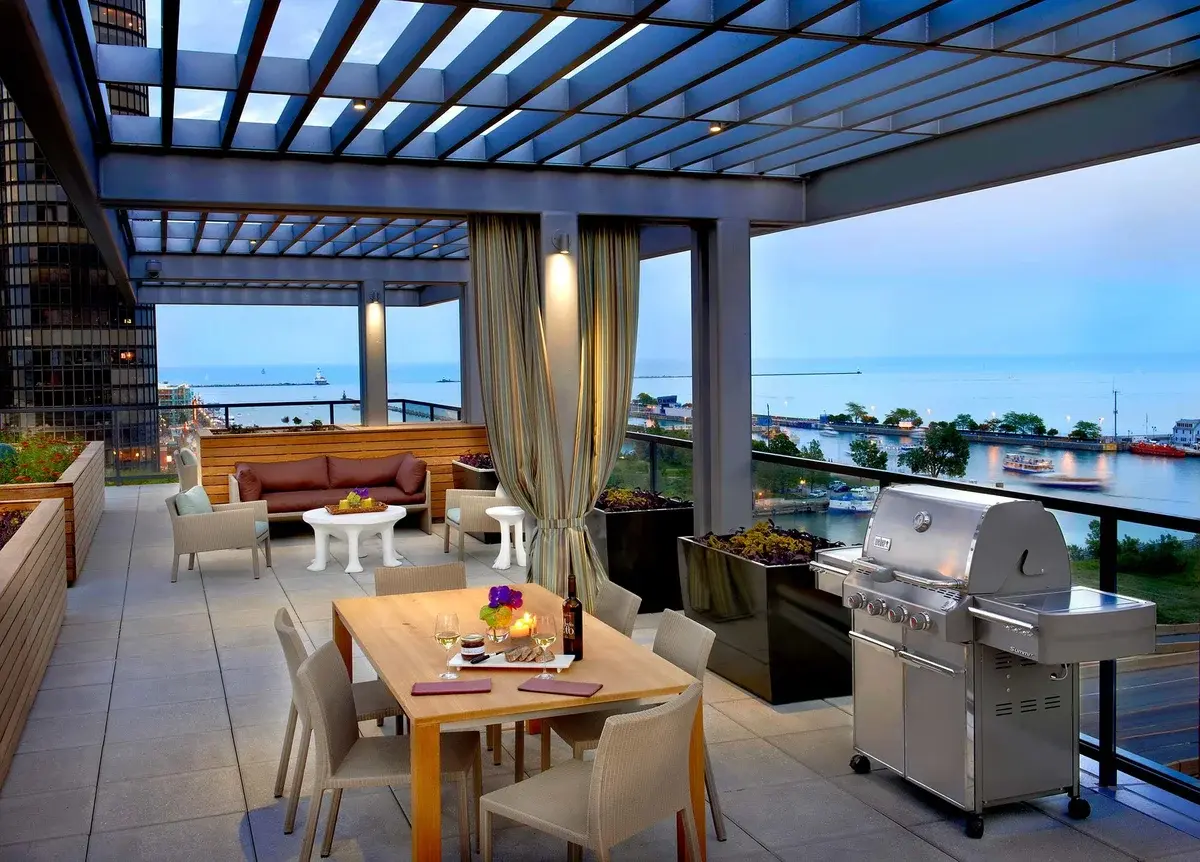 Group of professionals enjoying a luxury furnished corporate apartment in Downtown Chicago.