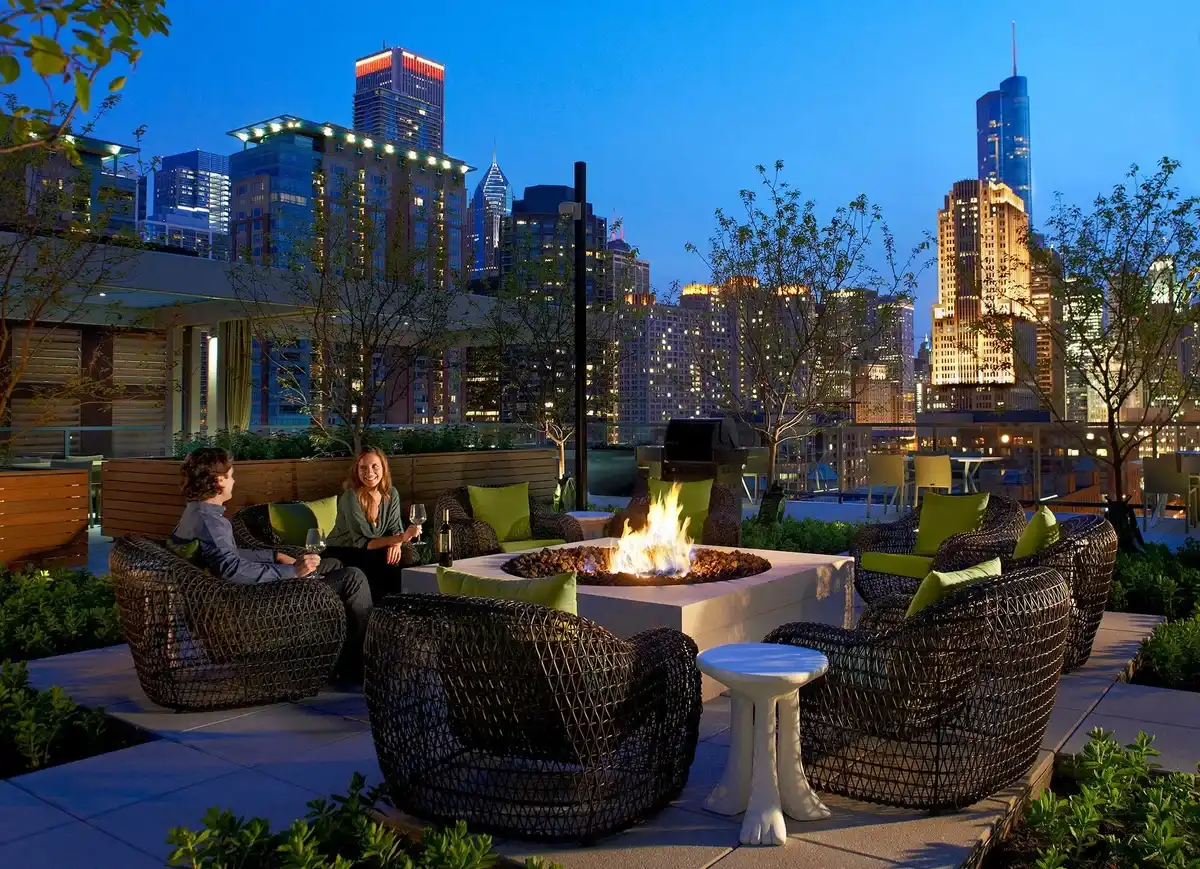 Group of professionals enjoying a luxury furnished corporate apartment in Downtown Chicago.