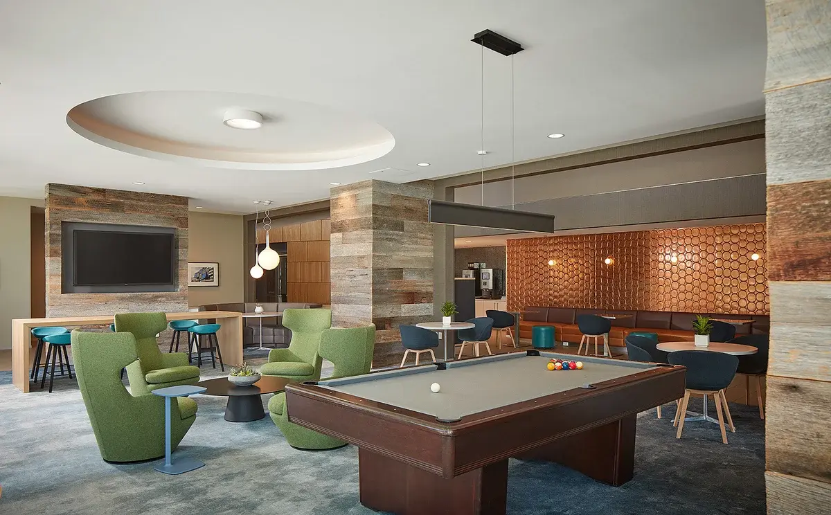 Group of professionals enjoying a luxury furnished corporate apartment in Downtown Chicago.