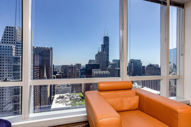Exploring Corporate Housing in an Apartment showing the Chicago Skyline.