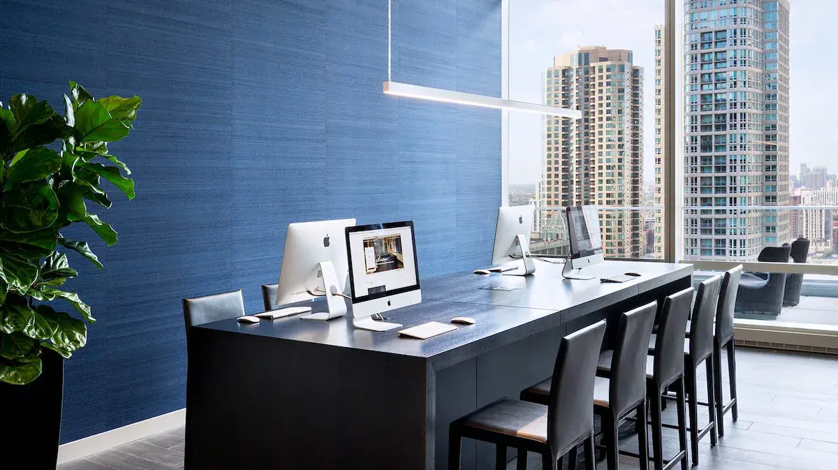 Group of professionals enjoying a luxury furnished corporate apartment in Downtown Chicago.