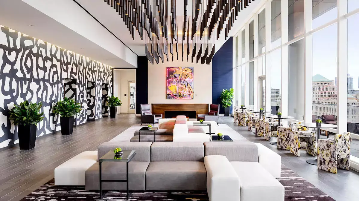 Group of professionals enjoying a luxury furnished corporate apartment in Downtown Chicago.