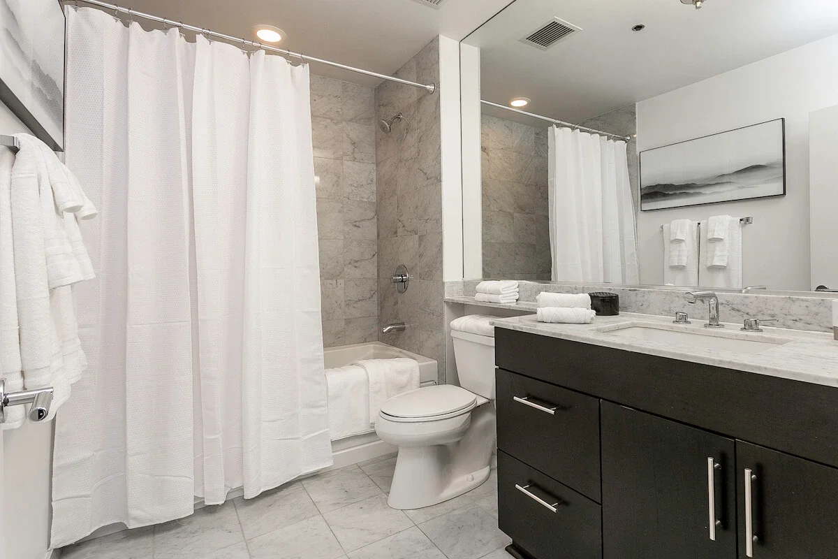 Group of professionals enjoying a luxury furnished corporate apartment in Downtown Chicago.