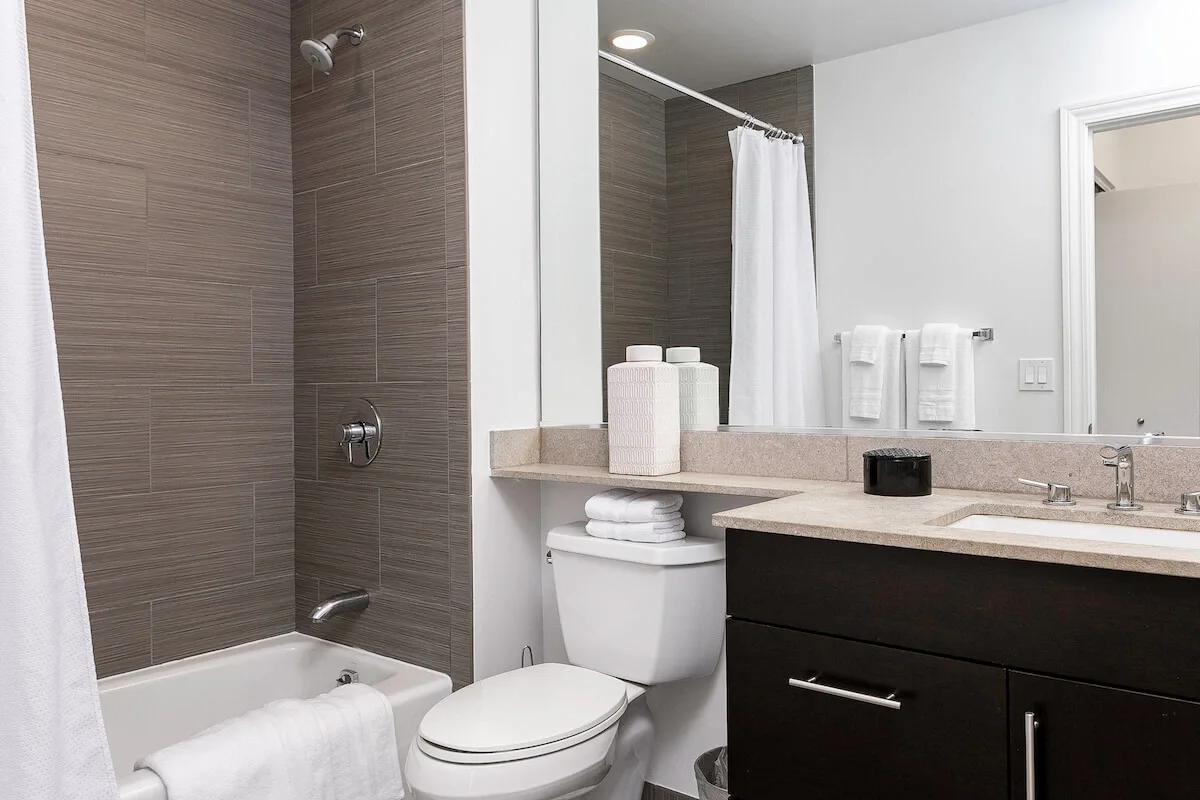 Group of professionals enjoying a luxury furnished corporate apartment in Downtown Chicago.