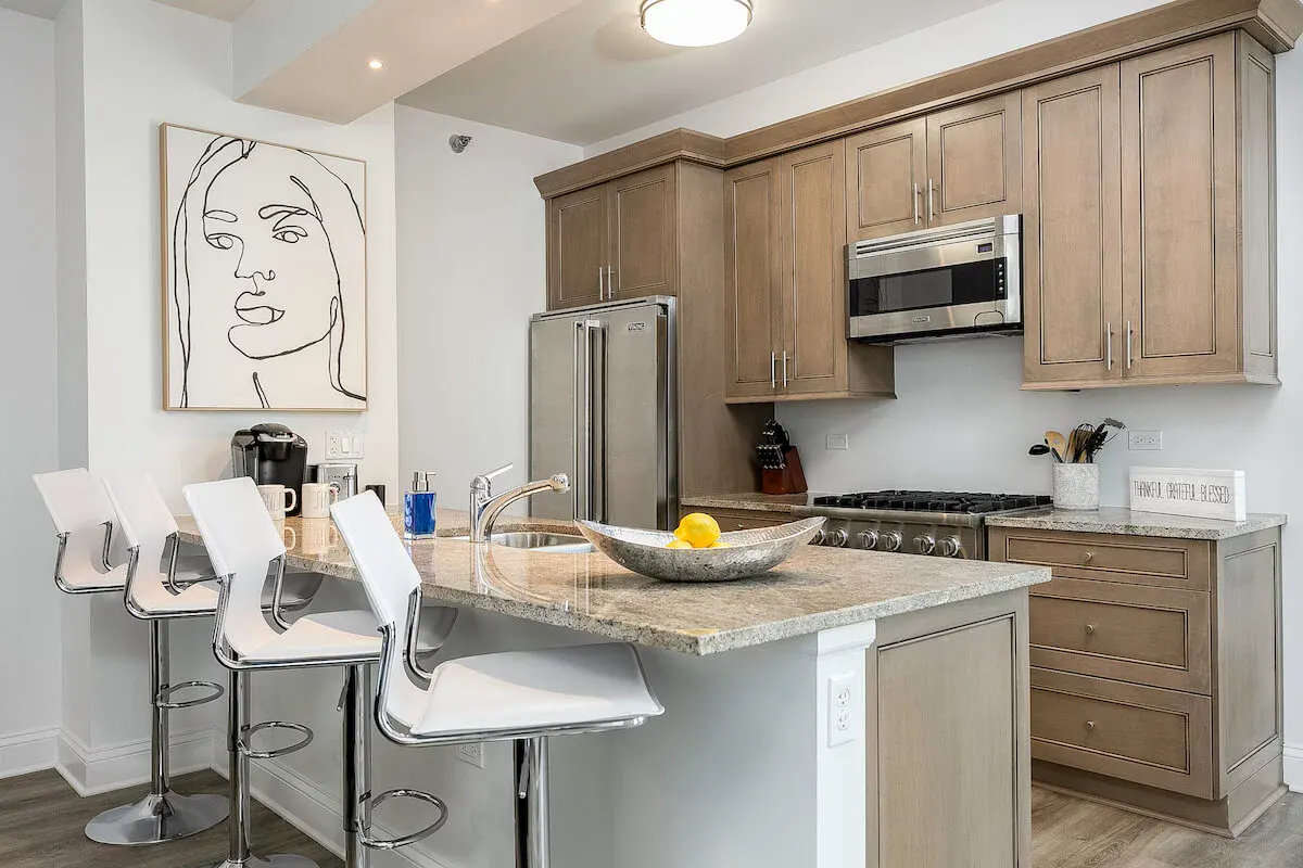 Group of professionals enjoying a luxury furnished corporate apartment in Downtown Chicago.