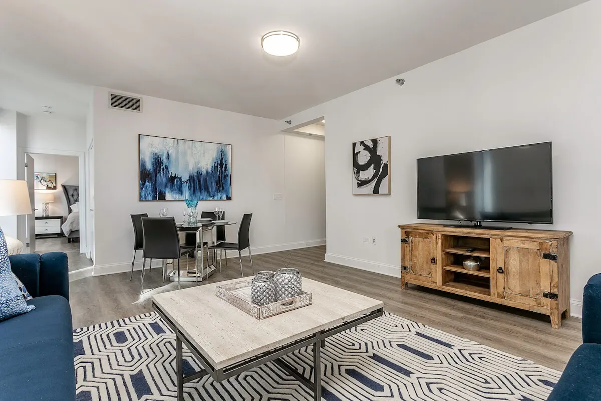 Group of professionals enjoying a luxury furnished corporate apartment in Downtown Chicago.