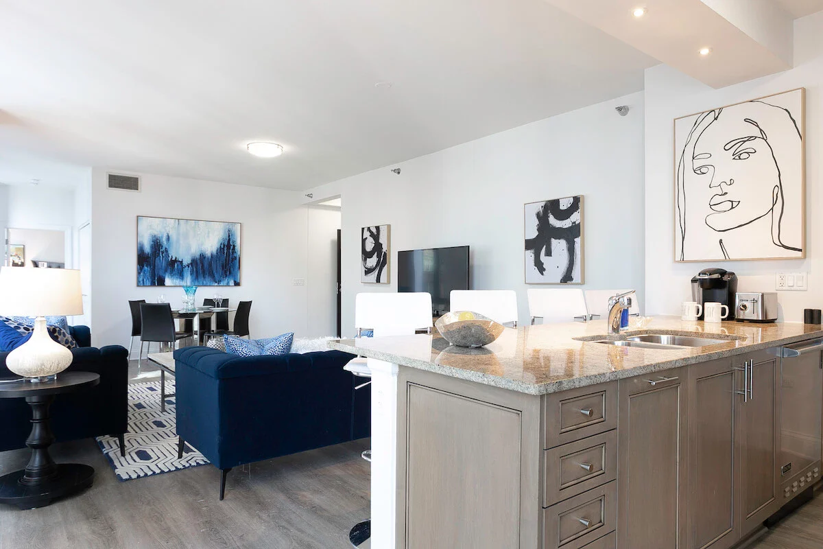 Group of professionals enjoying a luxury furnished corporate apartment in Downtown Chicago.