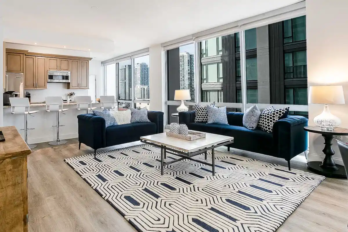 Group of professionals enjoying a luxury furnished corporate apartment in Downtown Chicago.