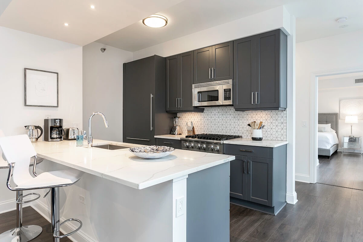 Group of professionals enjoying a luxury furnished corporate apartment in Downtown Chicago.