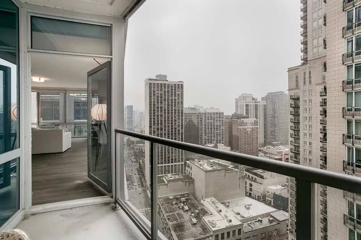 Group of professionals enjoying a luxury furnished corporate apartment in Downtown Chicago.