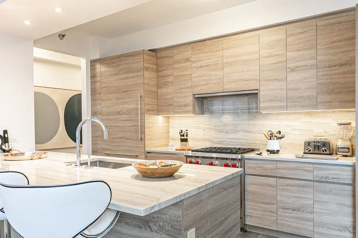 Group of professionals enjoying a luxury furnished corporate apartment in Downtown Chicago.