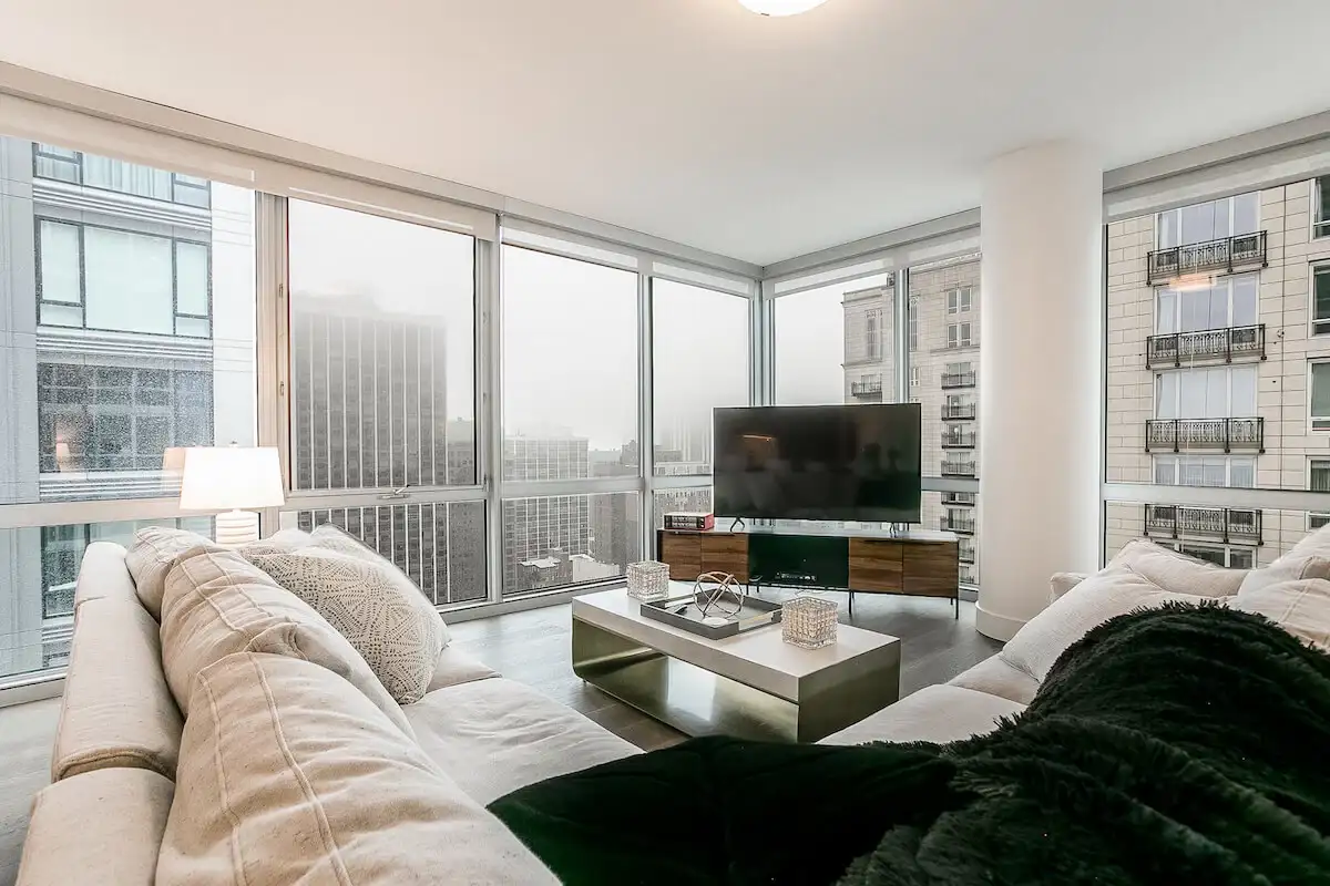 Group of professionals enjoying a luxury furnished corporate apartment in Downtown Chicago.