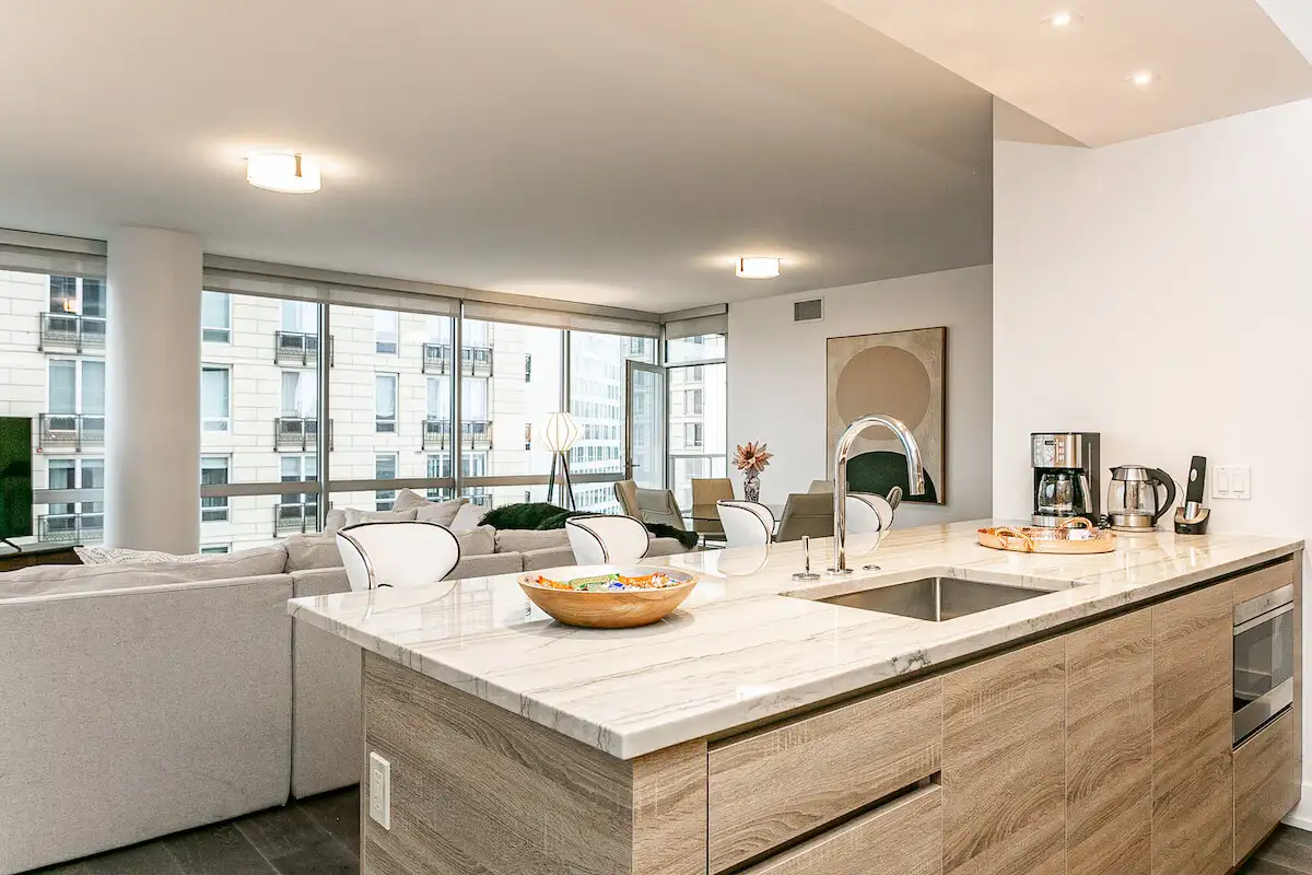 Group of professionals enjoying a luxury furnished corporate apartment in Downtown Chicago.