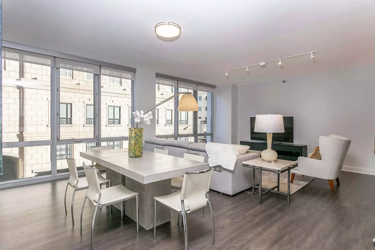 Group of professionals enjoying a luxury furnished corporate apartment in Downtown Chicago.