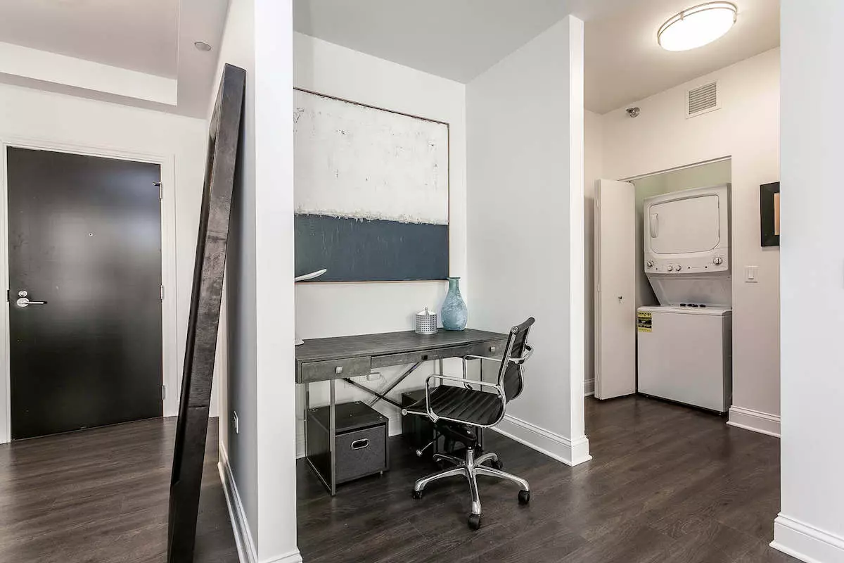 Group of professionals enjoying a luxury furnished corporate apartment in Downtown Chicago.