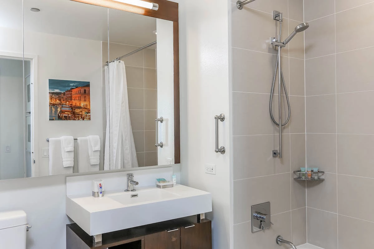 Group of professionals enjoying a luxury furnished corporate apartment in Downtown Chicago.