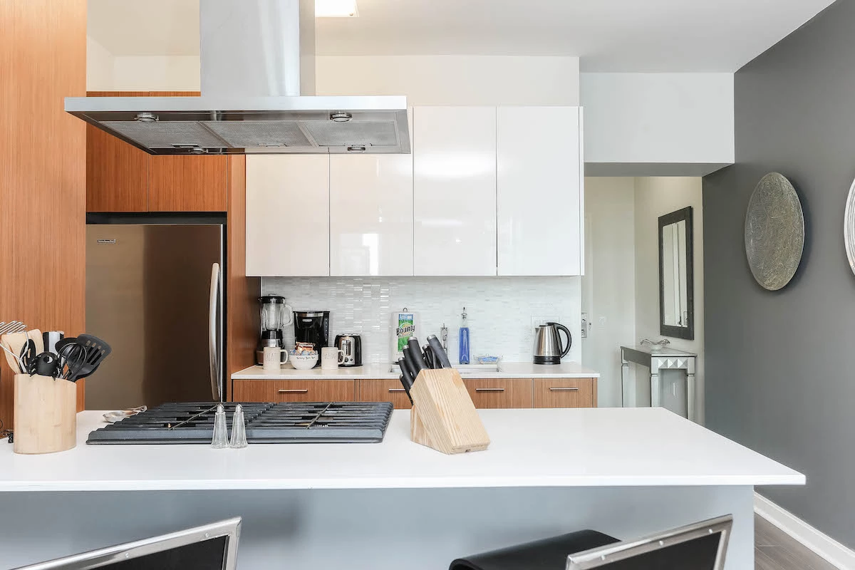 Group of professionals enjoying a luxury furnished corporate apartment in Downtown Chicago.