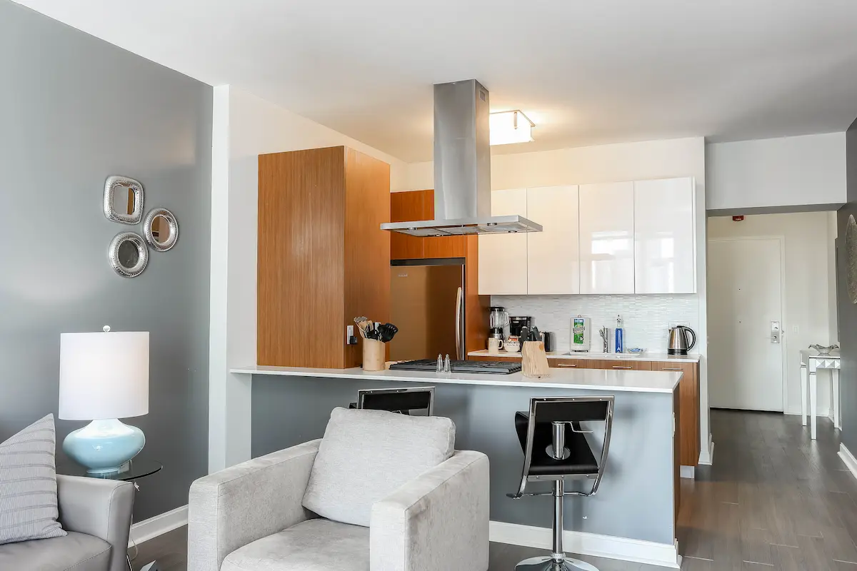 Group of professionals enjoying a luxury furnished corporate apartment in Downtown Chicago.