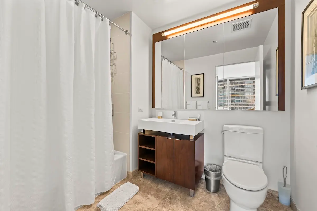 Group of professionals enjoying a luxury furnished corporate apartment in Downtown Chicago.