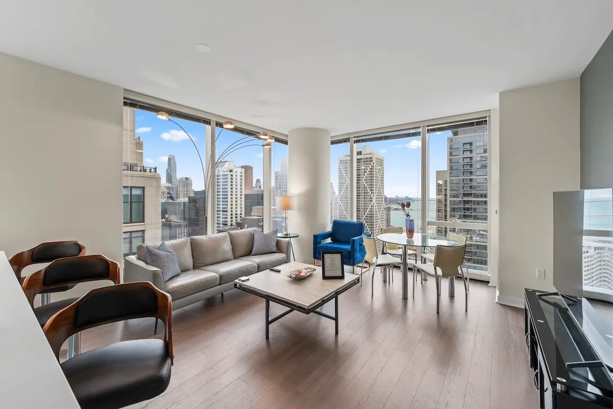 Group of professionals enjoying a luxury furnished corporate apartment in Downtown Chicago.