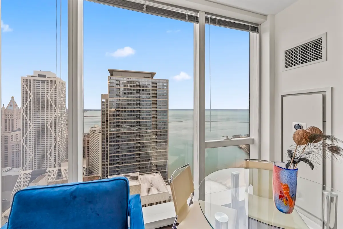 Group of professionals enjoying a luxury furnished corporate apartment in Downtown Chicago.