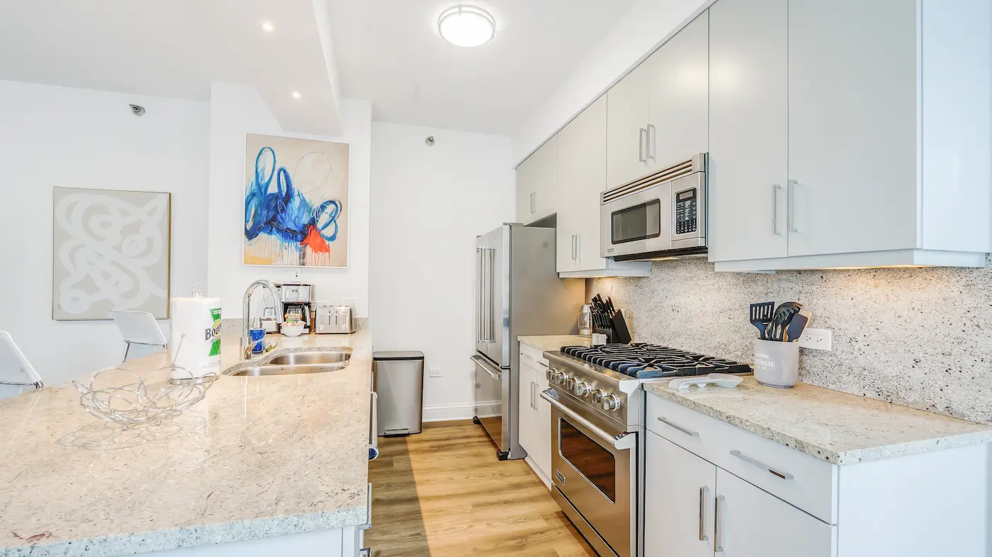 Group of professionals enjoying a luxury furnished corporate apartment in Downtown Chicago.