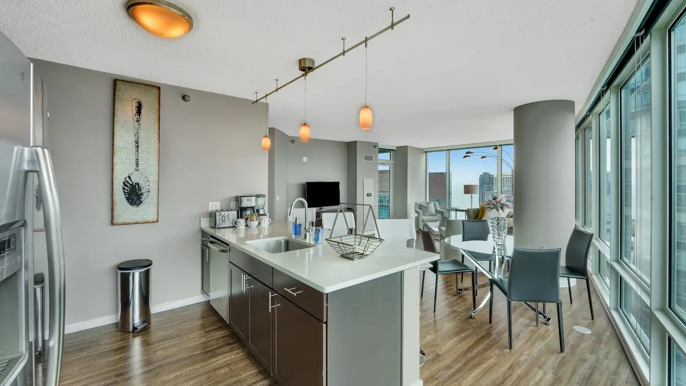 Group of professionals enjoying a luxury furnished corporate apartment in Downtown Chicago.