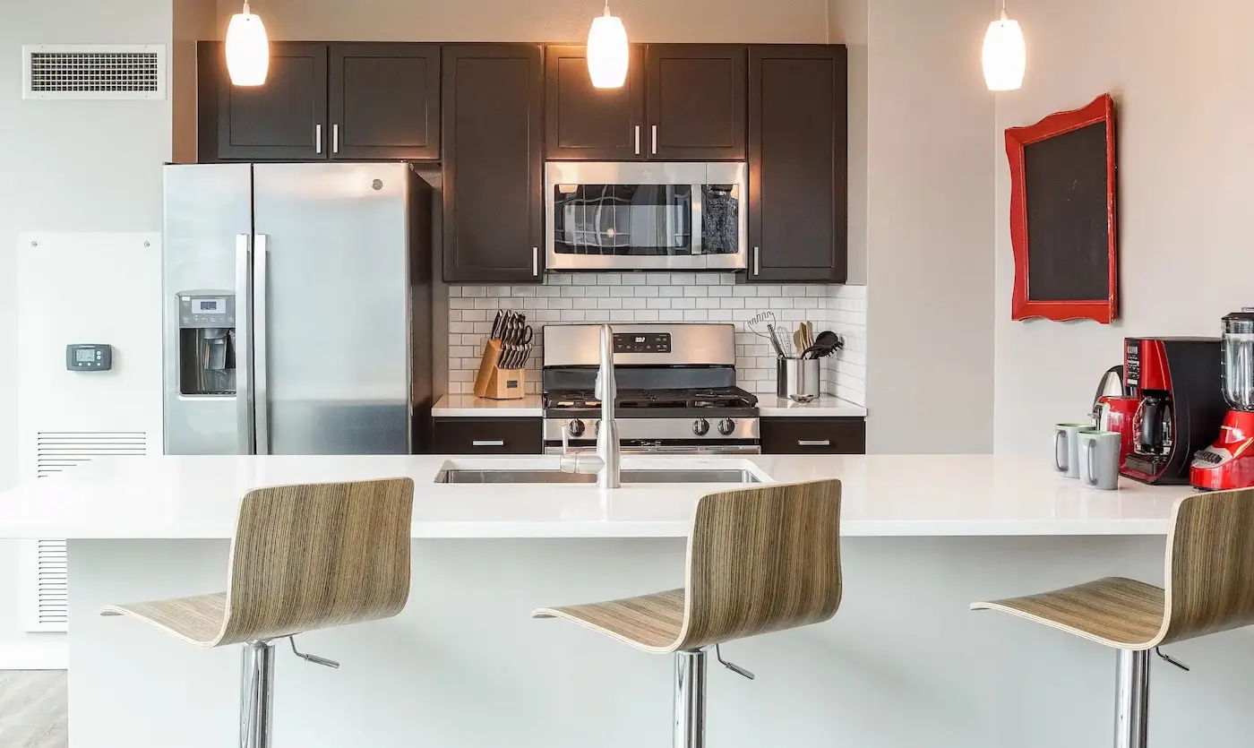 Group of professionals enjoying a luxury furnished corporate apartment in Downtown Chicago.