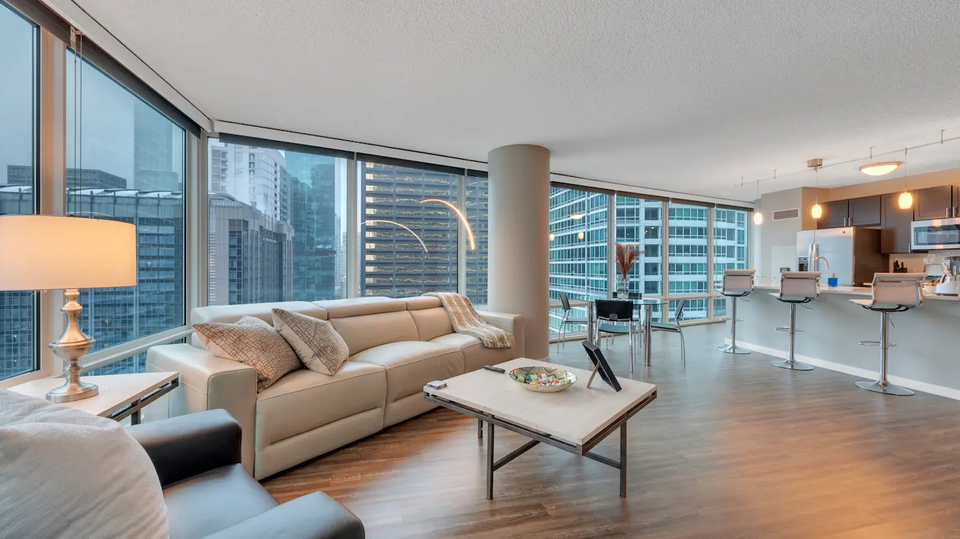 Group of professionals enjoying a luxury furnished corporate apartment in Downtown Chicago.