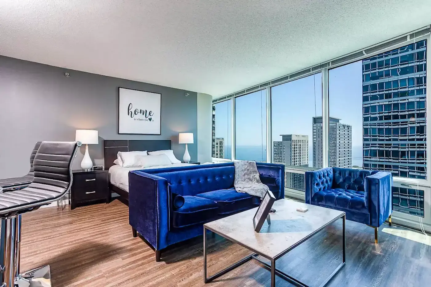 Group of professionals enjoying a luxury furnished corporate apartment in Downtown Chicago.