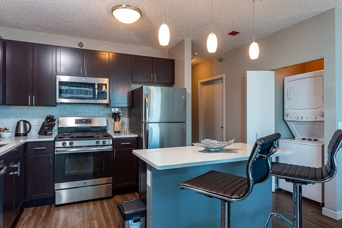 Group of professionals enjoying a luxury furnished corporate apartment in Downtown Chicago.