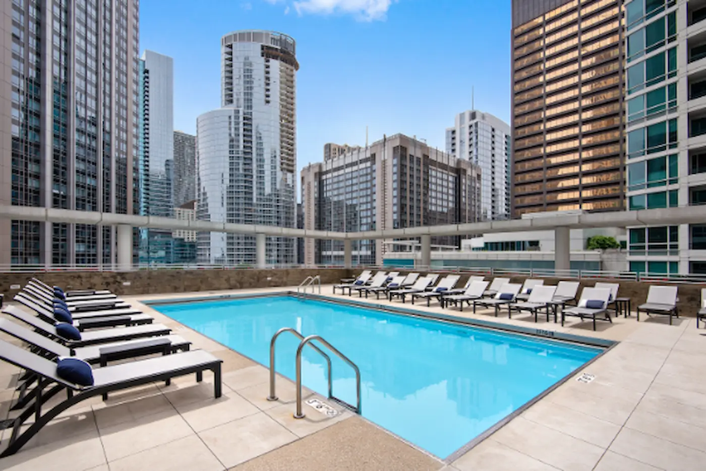 Group of professionals enjoying a luxury furnished corporate apartment in Downtown Chicago.