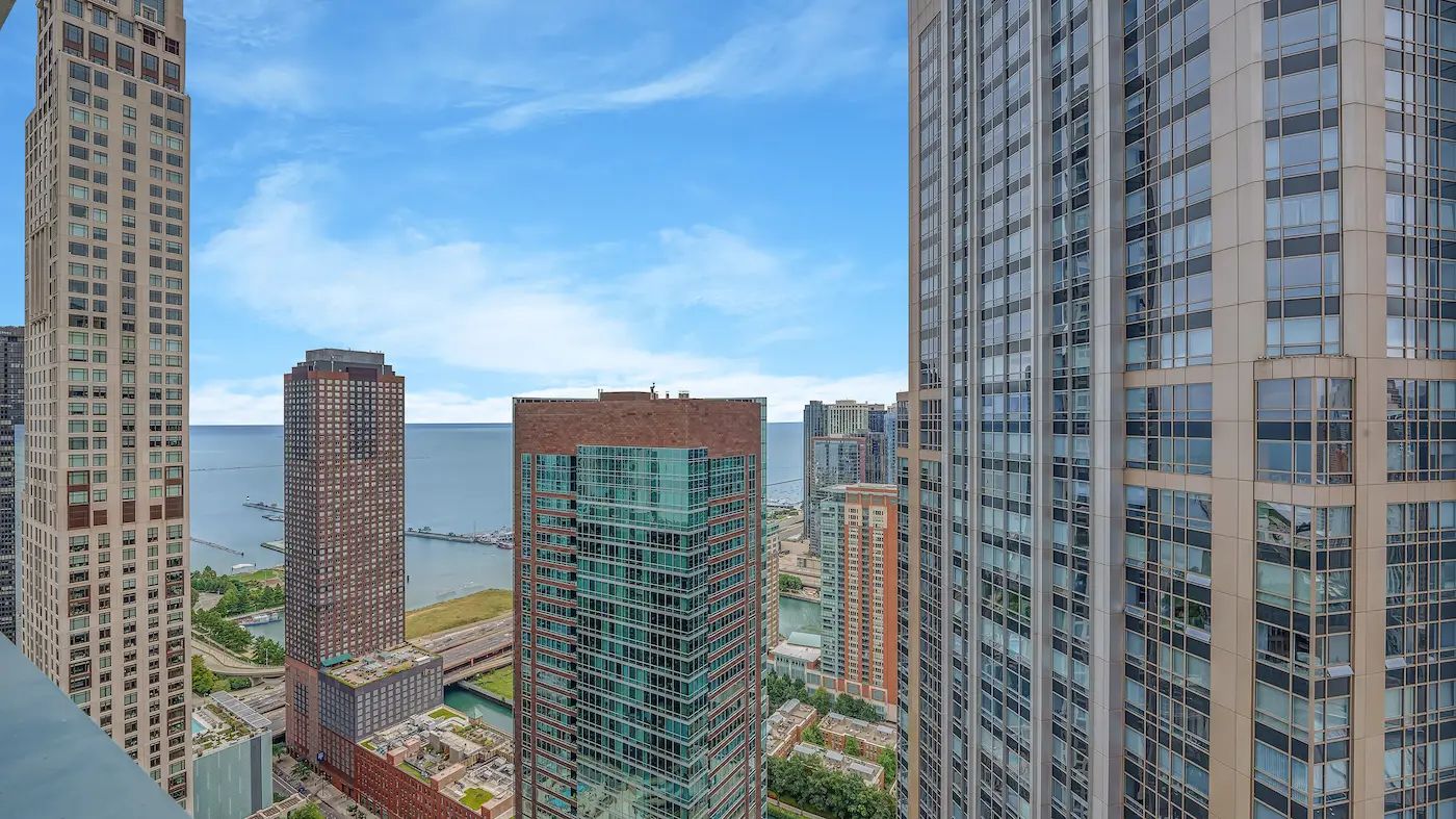 Group of professionals enjoying a luxury furnished corporate apartment in Downtown Chicago.