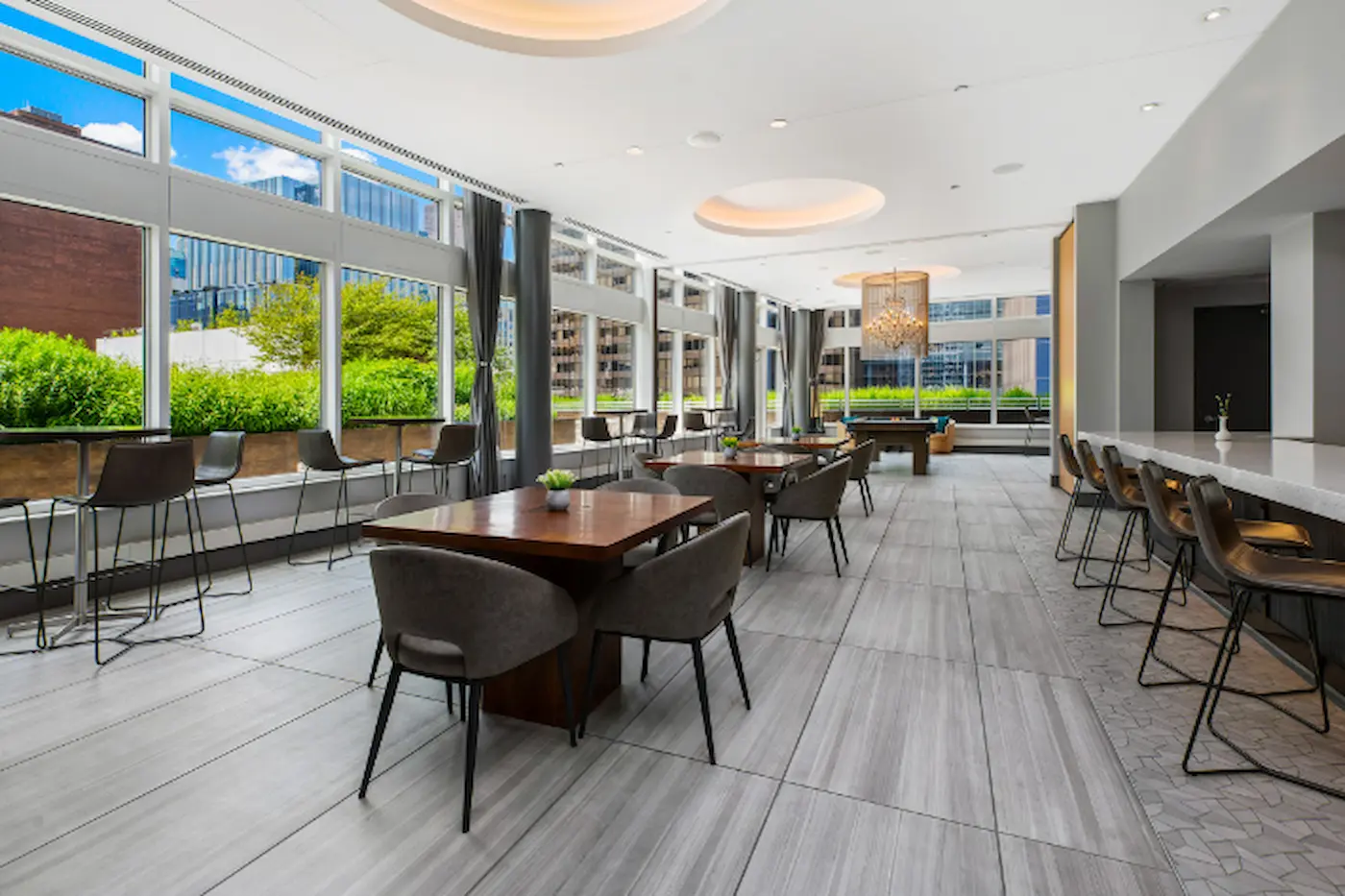 Group of professionals enjoying a luxury furnished corporate apartment in Downtown Chicago.