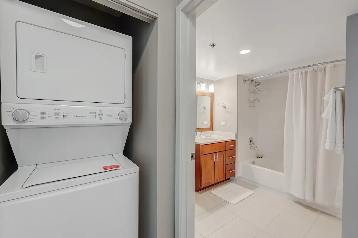 Group of professionals enjoying a luxury furnished corporate apartment in Downtown Chicago.