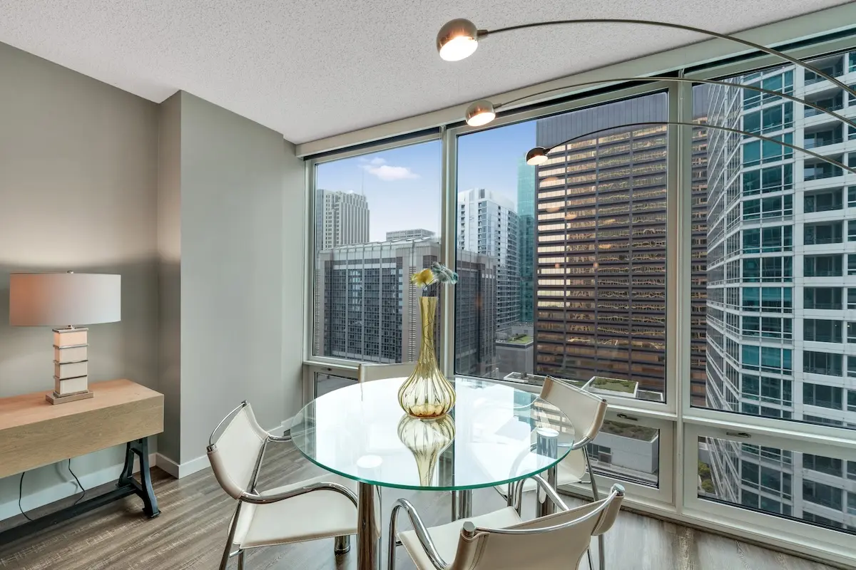 Group of professionals enjoying a luxury furnished corporate apartment in Downtown Chicago.