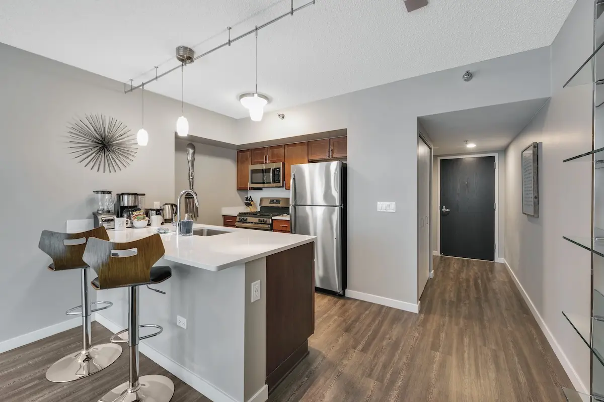 Group of professionals enjoying a luxury furnished corporate apartment in Downtown Chicago.