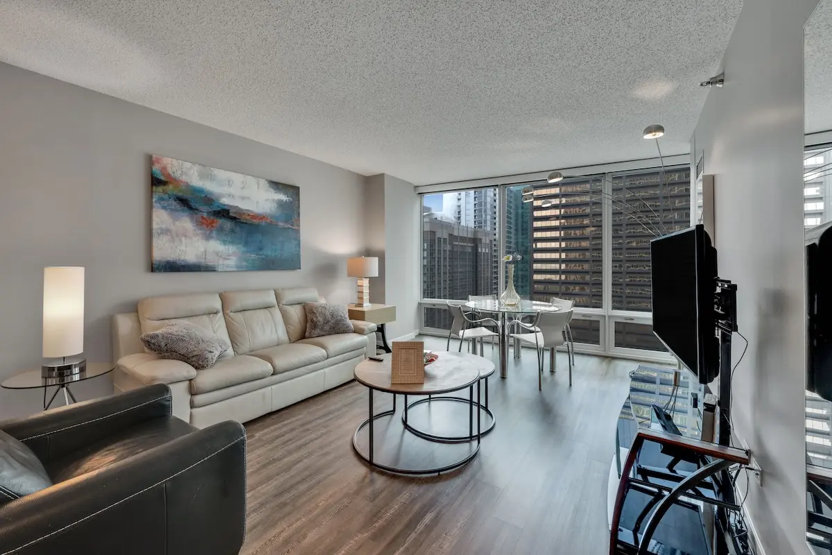 Group of professionals enjoying a luxury furnished corporate apartment in Downtown Chicago.