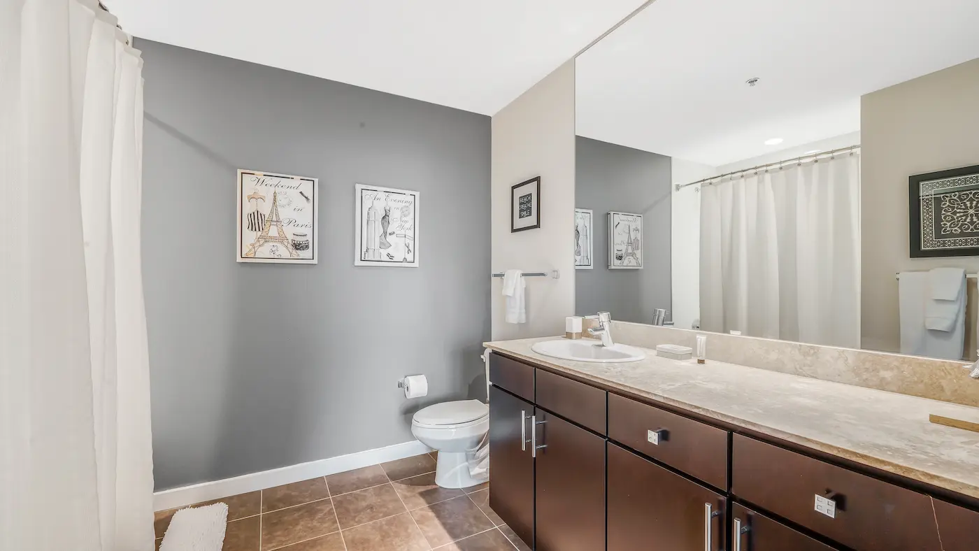 Group of professionals enjoying a luxury furnished corporate apartment in Downtown Chicago.