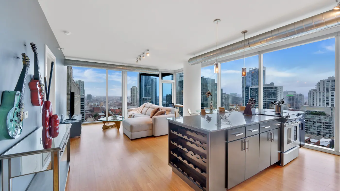 Group of professionals enjoying a luxury furnished corporate apartment in Downtown Chicago.