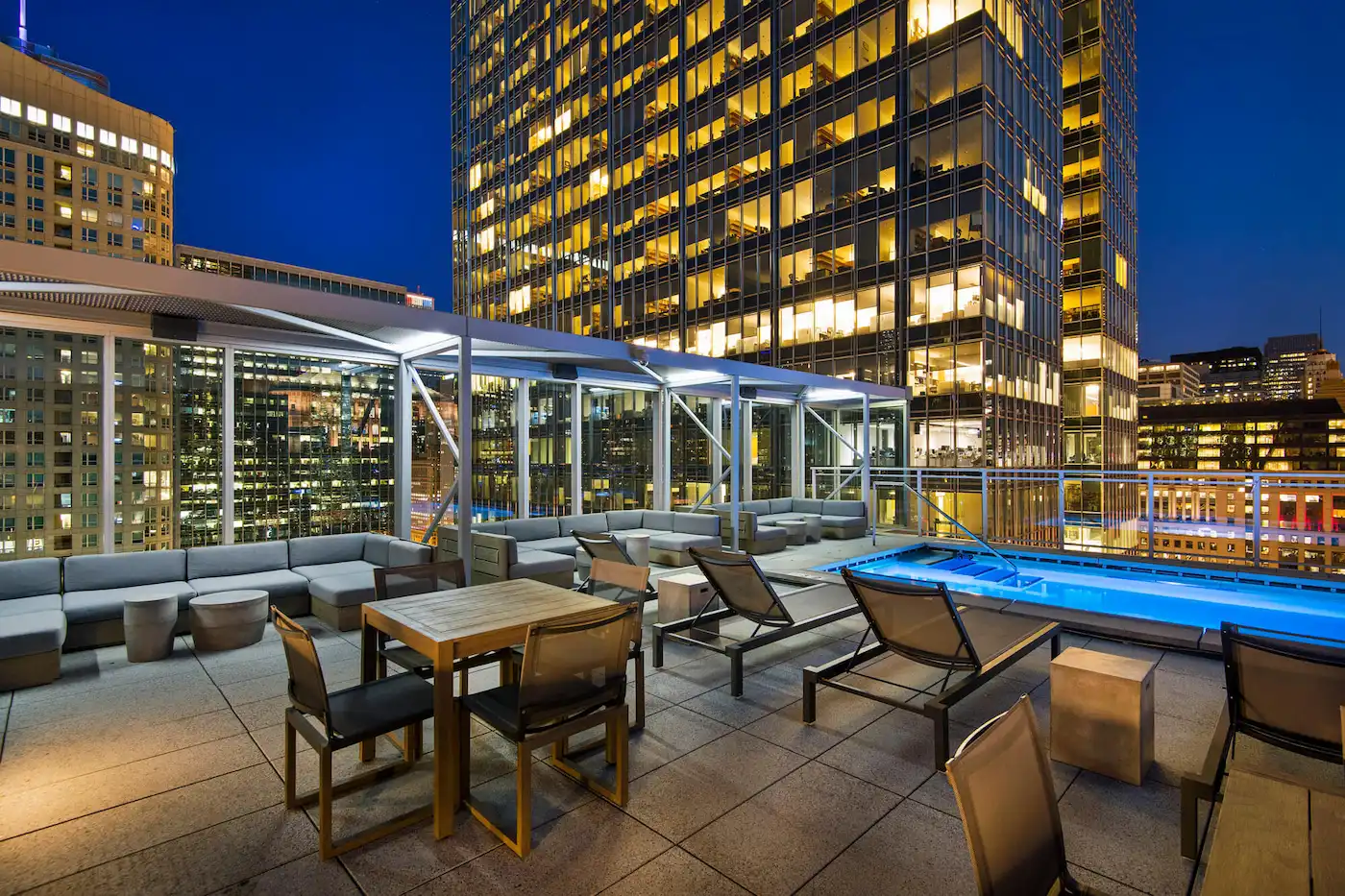 Group of professionals enjoying a luxury furnished corporate apartment in Downtown Chicago.