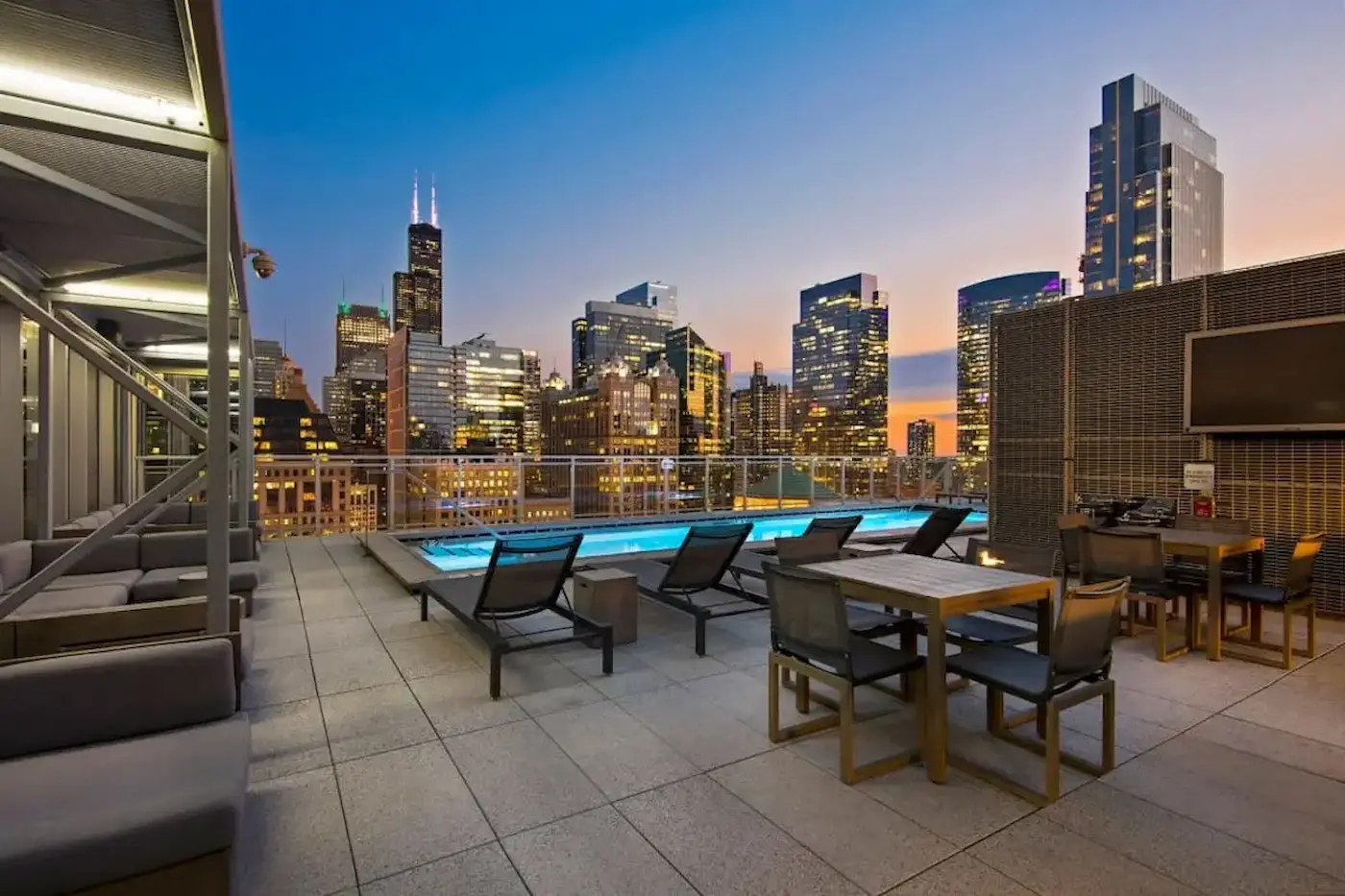 Group of professionals enjoying a luxury furnished corporate apartment in Downtown Chicago.