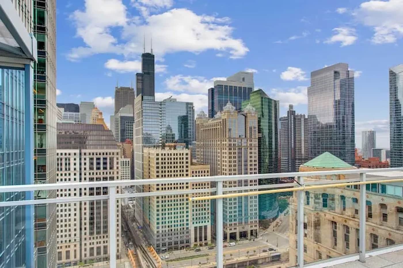 Group of professionals enjoying a luxury furnished corporate apartment in Downtown Chicago.