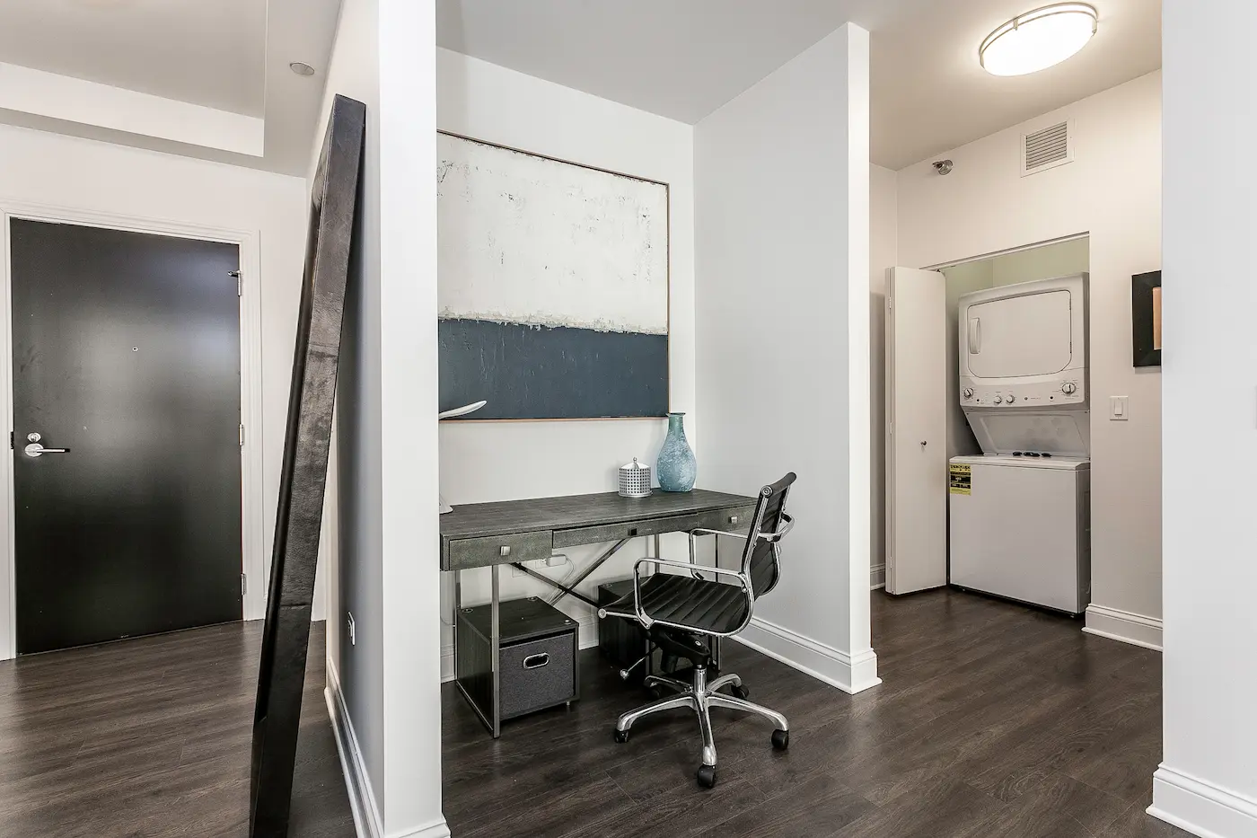 Group of professionals enjoying a luxury furnished corporate apartment in Downtown Chicago.