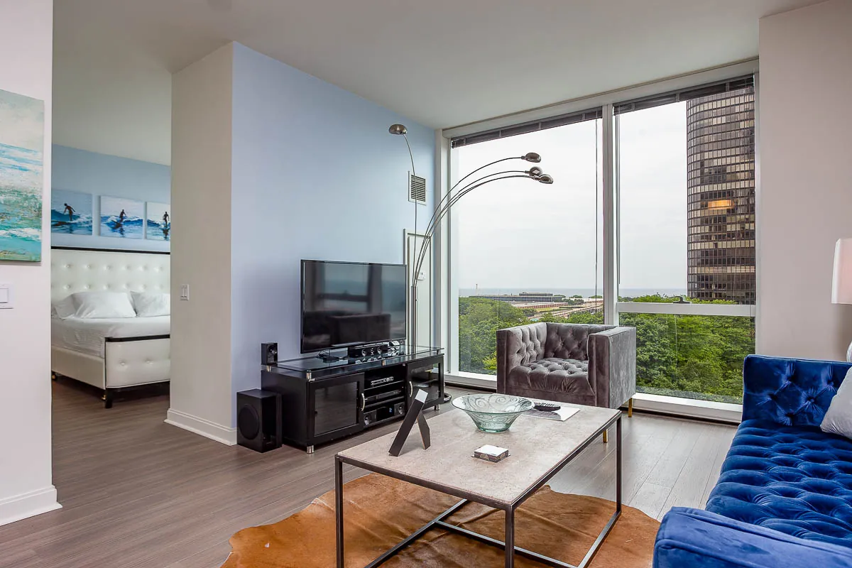 Modern temporary housing apartment in Chicago with city views and furnished living space.
