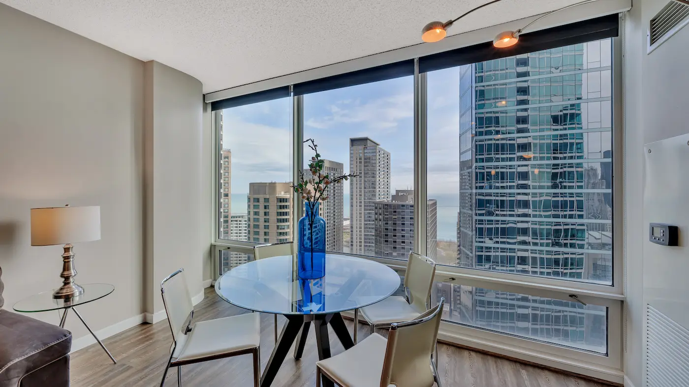 Group of professionals enjoying a luxury furnished corporate apartment in Downtown Chicago.