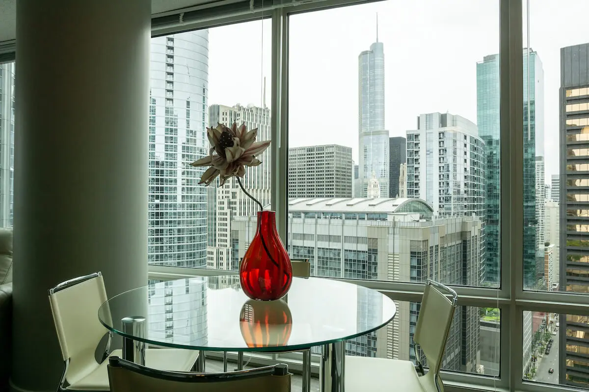 Group of professionals enjoying a luxury furnished corporate apartment in Downtown Chicago.