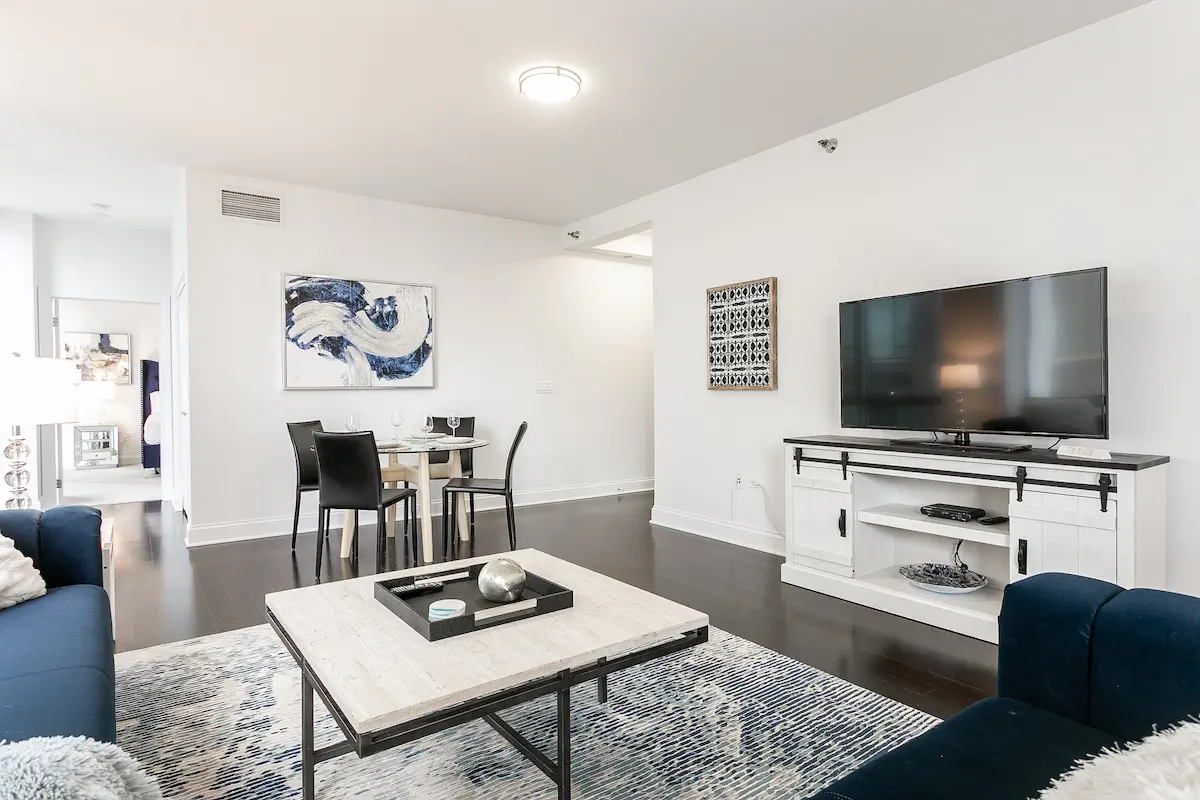 Group of professionals enjoying a luxury furnished corporate apartment in Downtown Chicago.